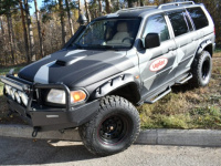 Расширители колёсных арок Mitsubishi Pajero Sport I (1998-2007) (под силовой бампер)